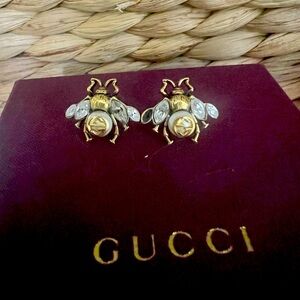 Gold Gucci BumbleBee stud earrings with GG monogram